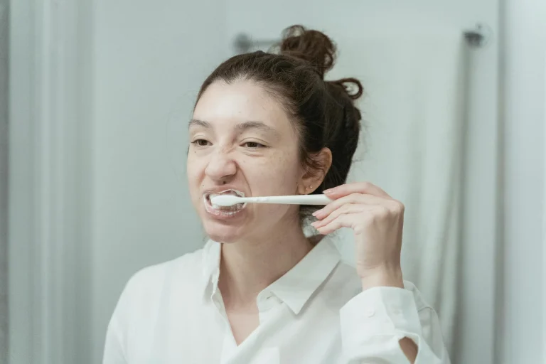 A Women Brushing After Eating